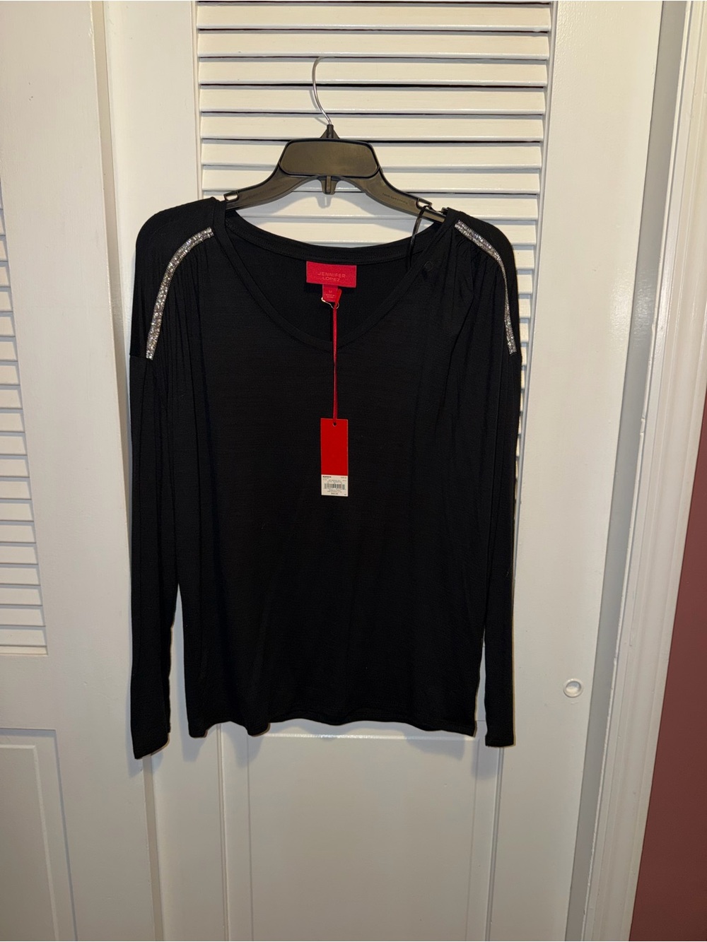 Jennifer Lopez black embellished shoulder, long sleeve top / med/ NWT